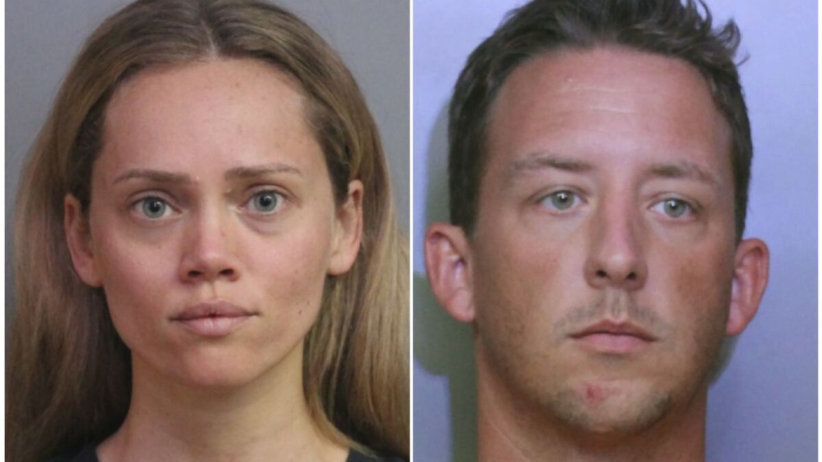 Booking photos provided by the Polk County Sheriff's Office show Courtney Irby, left, and her husband Joseph Irby.