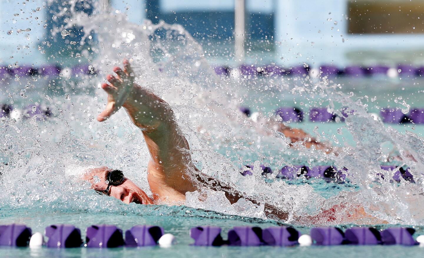 Burroughs Ema Nathan swims neck-and-neck with Hoover's Lusin Yengibaryan in a Pacific League dual swim meet at Hoover High School on Wednesday, March 13, 2019.