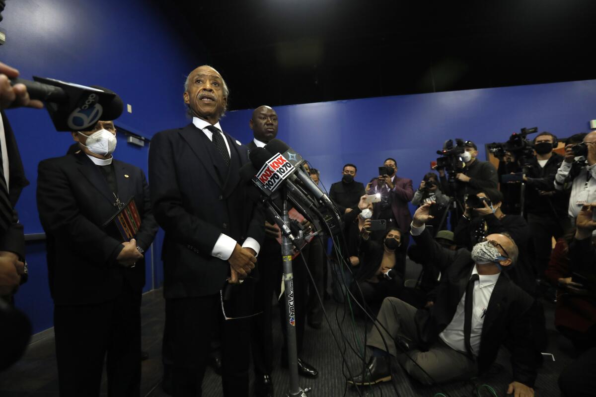 The Rev. Al Sharpton speaks to the media before the start of Valentina Orellana-Peralta's funeral.