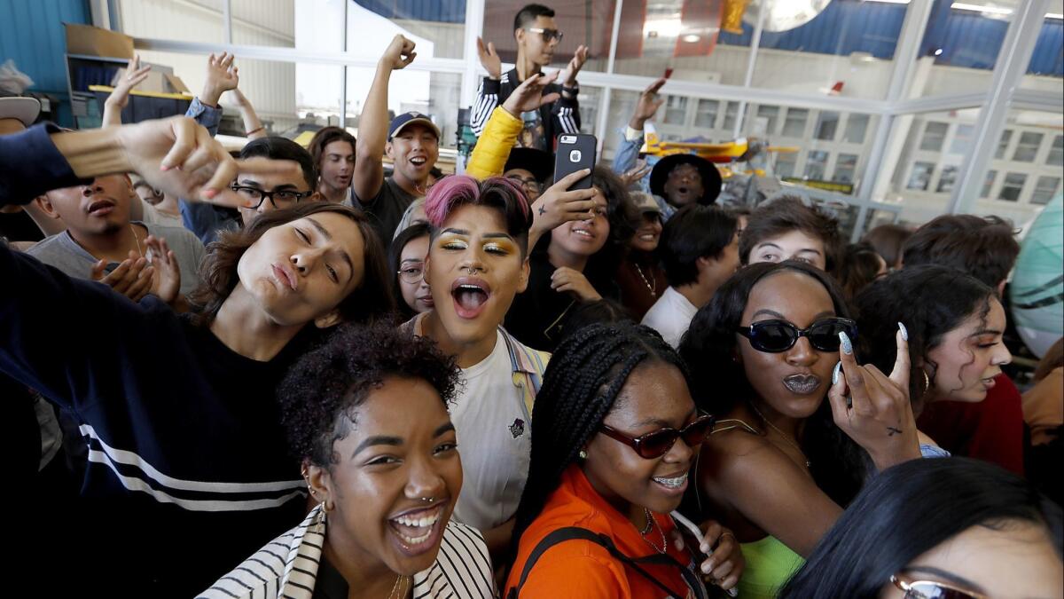 Fans line up for the chance to meet Steve Lacy during a record release party at the Compton Municipal Airport.