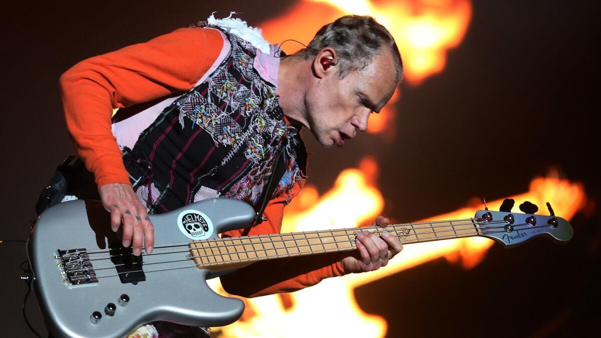 Flea performing with the Red Hot Chili Peppers in March 2018.