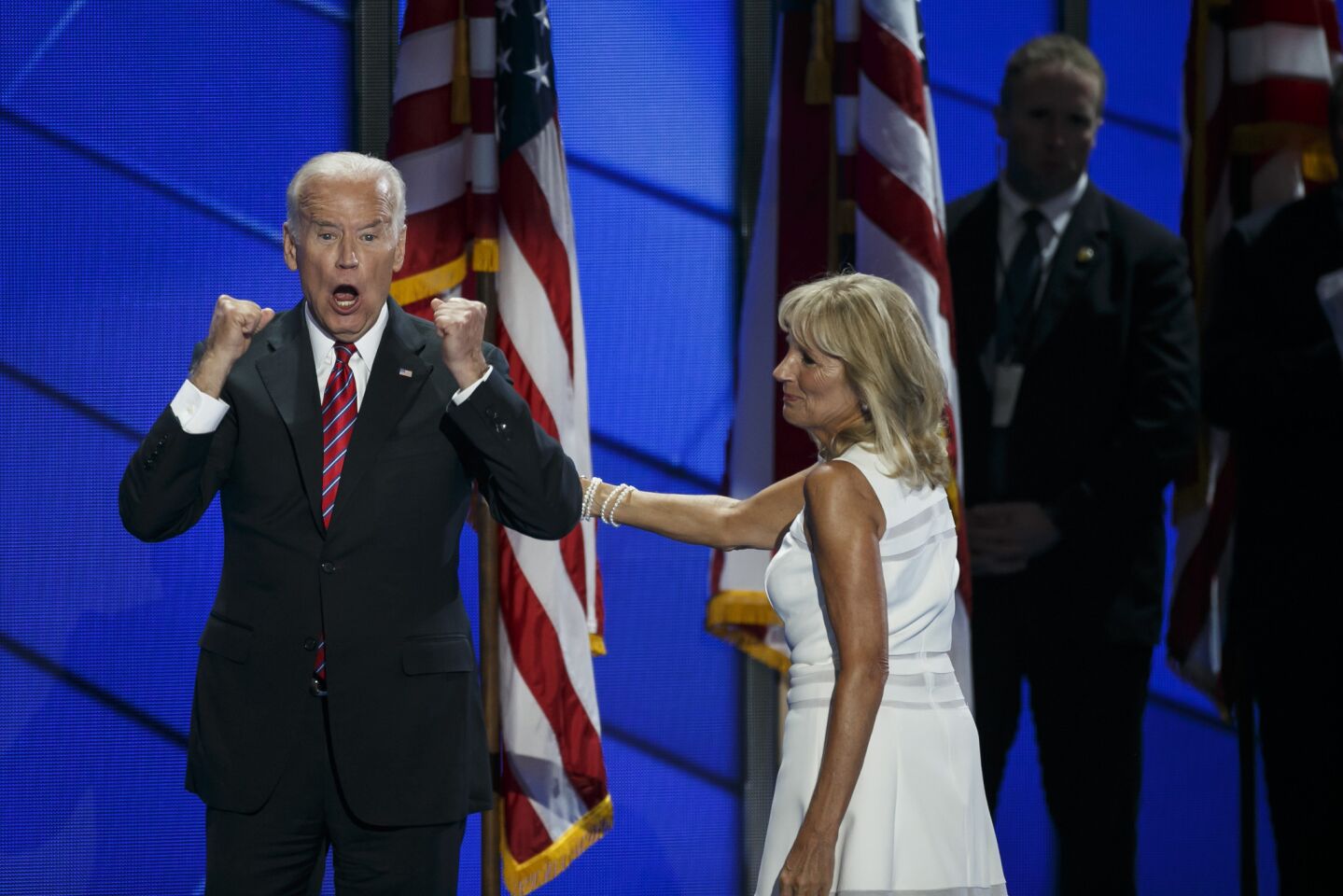 Vice President Joe Biden and his wife, Jill, exit the stage.