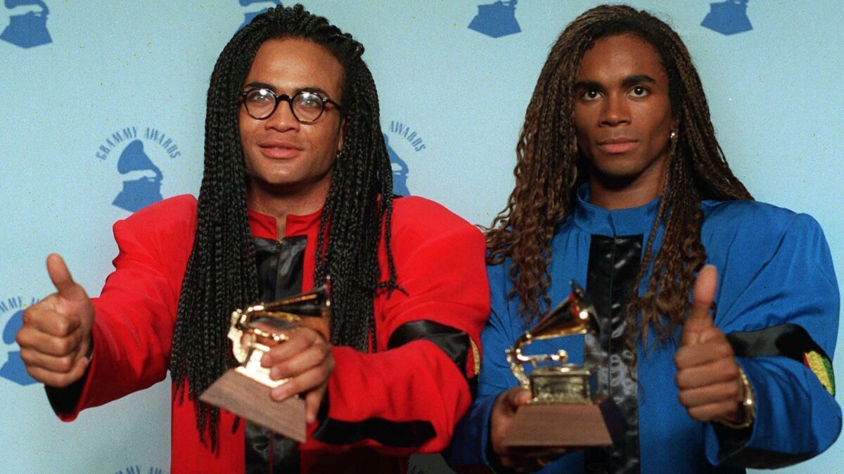 Milli Vanilli's Rob Pilatus, left, and Fab Morvan were stripped of their Grammy for Best New Artist after it was learned they didn't sing on the duo's hit album.