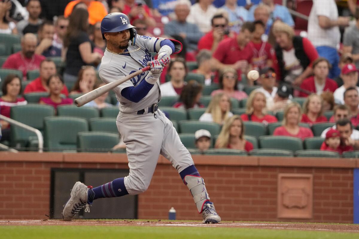 Mookie Betts doubles for the Dodgers during a loss.