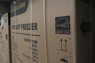 An energy star logo is displayed on a box for a freezer.