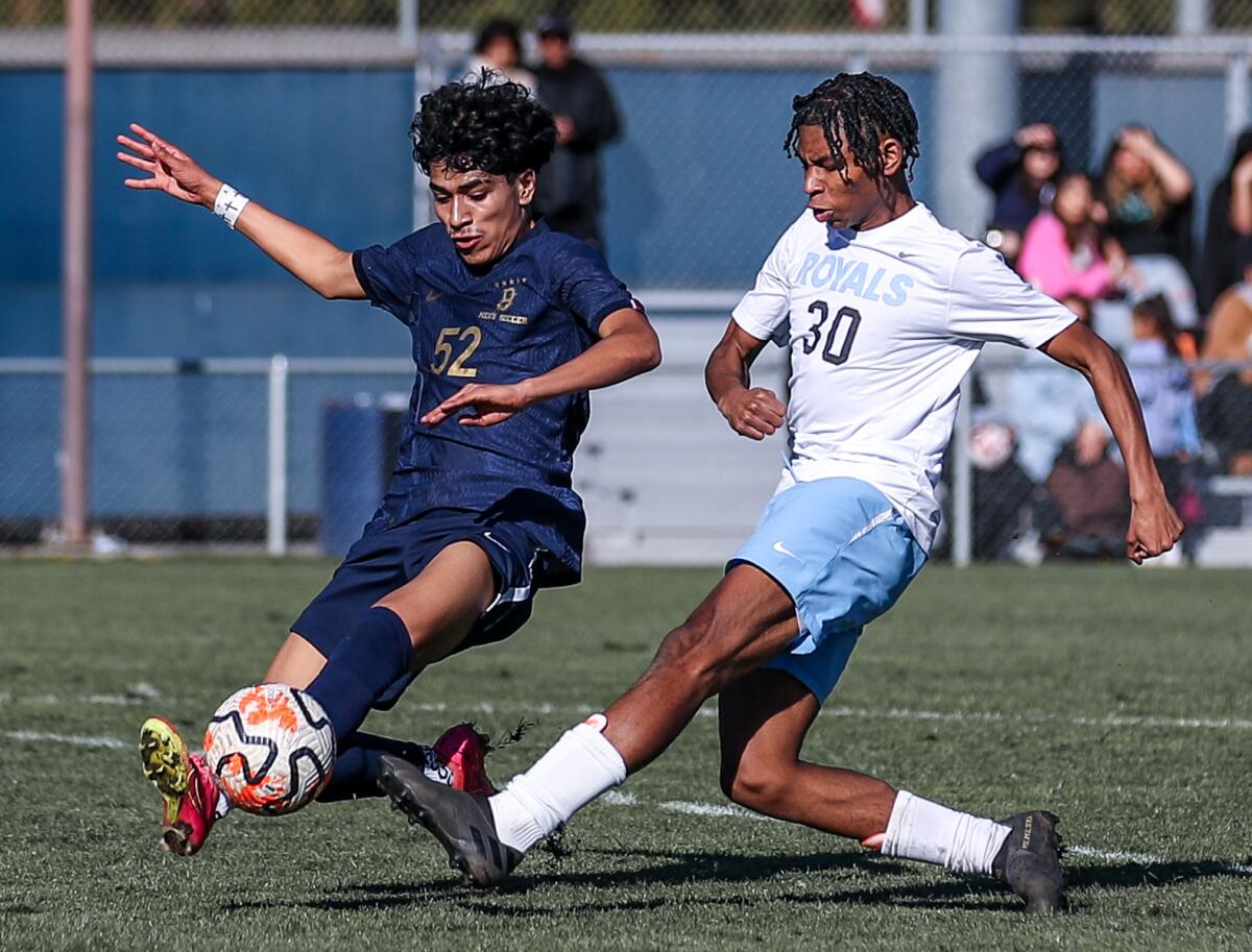 Steven Ramos of Birmingham (left) faces pressure from El Camino Real's Mekhi Celifie.