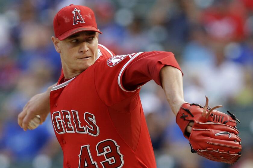 Angels starter Garrett Richards delivers a pitch against the Texas Rangers in July.