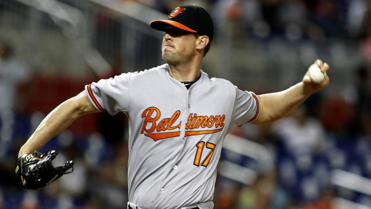 Baltimore Orioles reliever Brian Matusz delivers a pitch during the 12th inning of the team's 1-0 loss to the Miami Marlins on May 23.