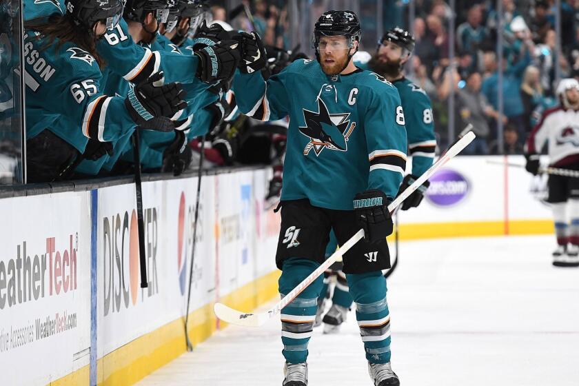 SAN JOSE, CA - MAY 08: Joe Pavelski #8 of the San Jose Sharks is congratulated by teammates after he scored a goal against the Colorado Avalanche during the first period in Game Seven of the Western Conference Second Round during the 2019 NHL Stanley Cup Playoffs at SAP Center on May 8, 2019 in San Jose, California. (Photo by Thearon W. Henderson/Getty Images) ** OUTS - ELSENT, FPG, CM - OUTS * NM, PH, VA if sourced by CT, LA or MoD **