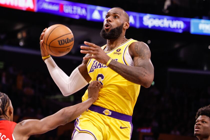 LOS ANGELES, CA - FEBRUARY 15: Los Angeles Lakers forward LeBron James (6) goes up for a shot.