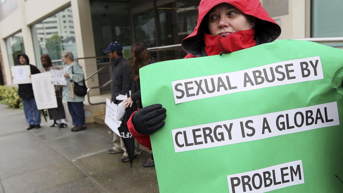 Members of the group SNAP, the Survivors Network of those Abused by Priests, protest at the offices of the San Francisco Archdiocese in 2010.