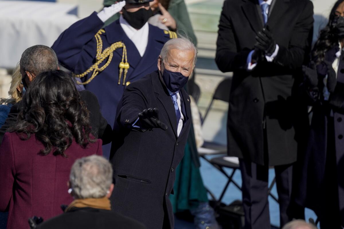 U.S. President Joe Biden acknowledges the audience after being sworn in as the 46th president.