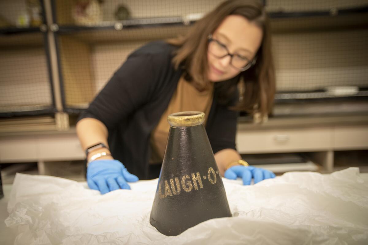 Melissa Pankuch of the Walt Disney Archives unpacks Walt Disney's 1922 Laugh-O-Gram megaphone.