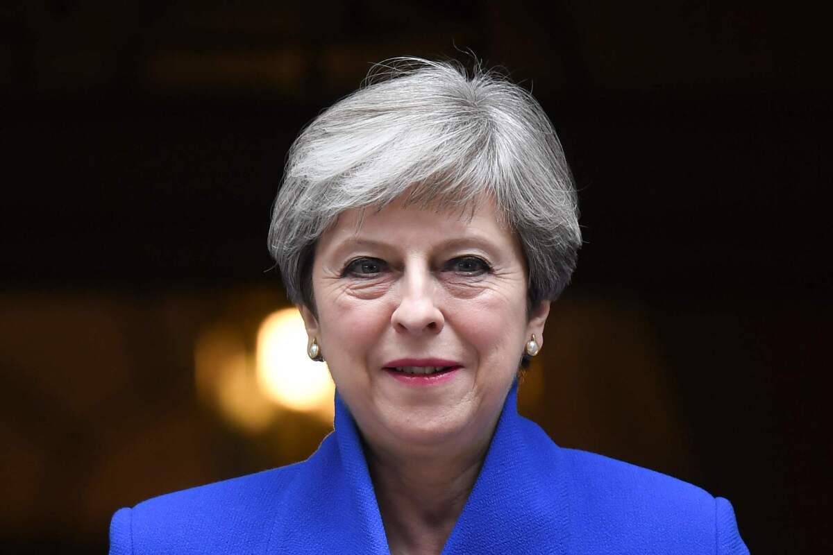 Prime Minister Theresa May leaves 10 Downing Street after the election. (Justin Tallis / AFP/Getty Images)