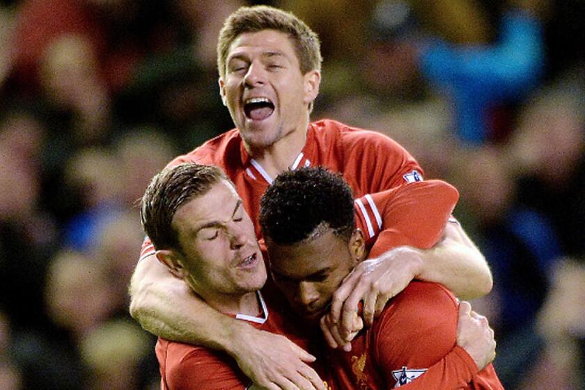 Liverpool's Jordan Henderson, left, Steven Gerrard and Daniel Sturridge made the cut for the English World Cup team.