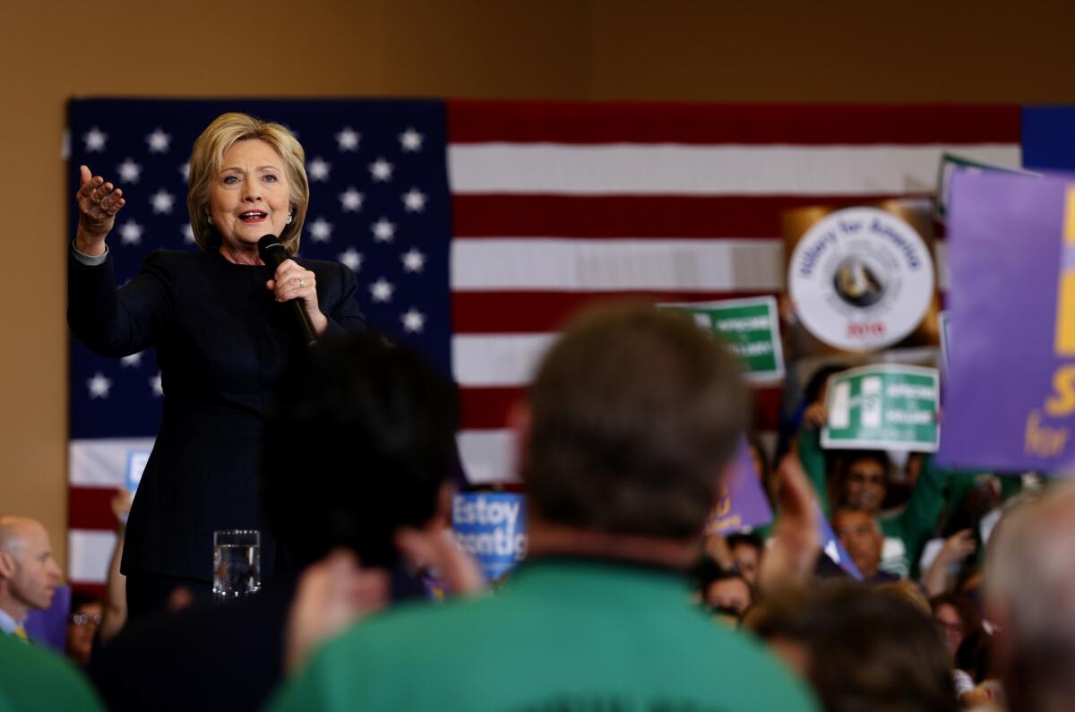Hillary Clinton speaks to a crowd at Painters Hall in Henderson, Nev.