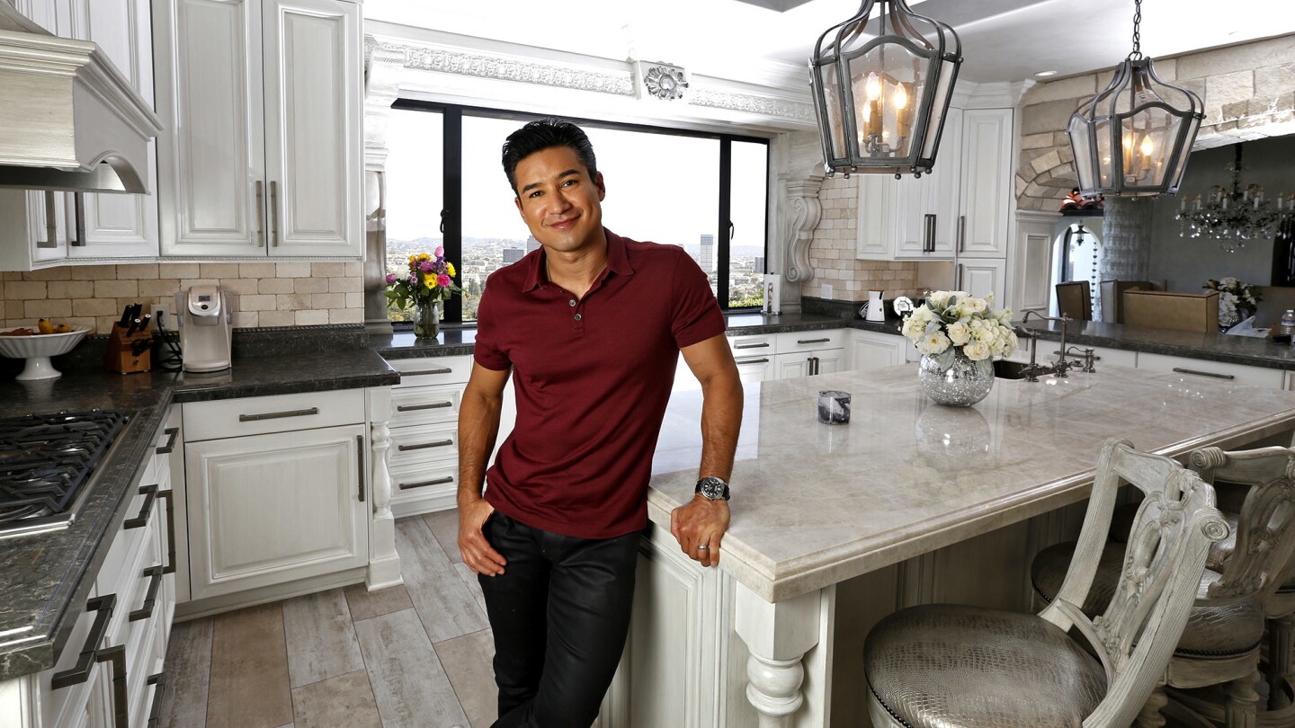 A big window lessened cabinet space but turned out to be a good remodeling move, says "Extra" host Mario Lopez.