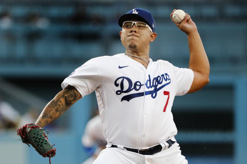 LOS ANGELES, CA - AUGUST 9, 2022: Los Angeles Dodgers starting pitcher Julio Urias (7) pitches to the Minnesota Twins.