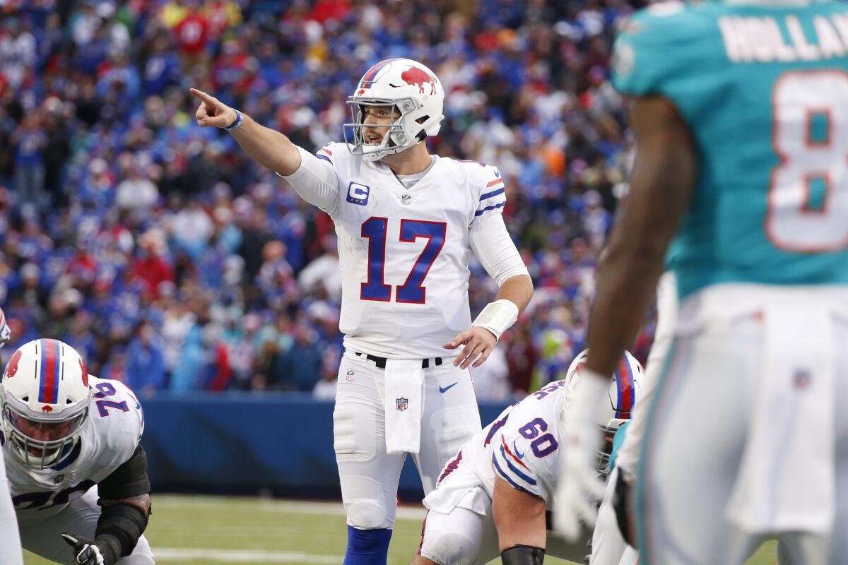 Buffalo Bills quarterback Josh Allen directs a teammate before a snap against the Miami Dolphins on Sunday.