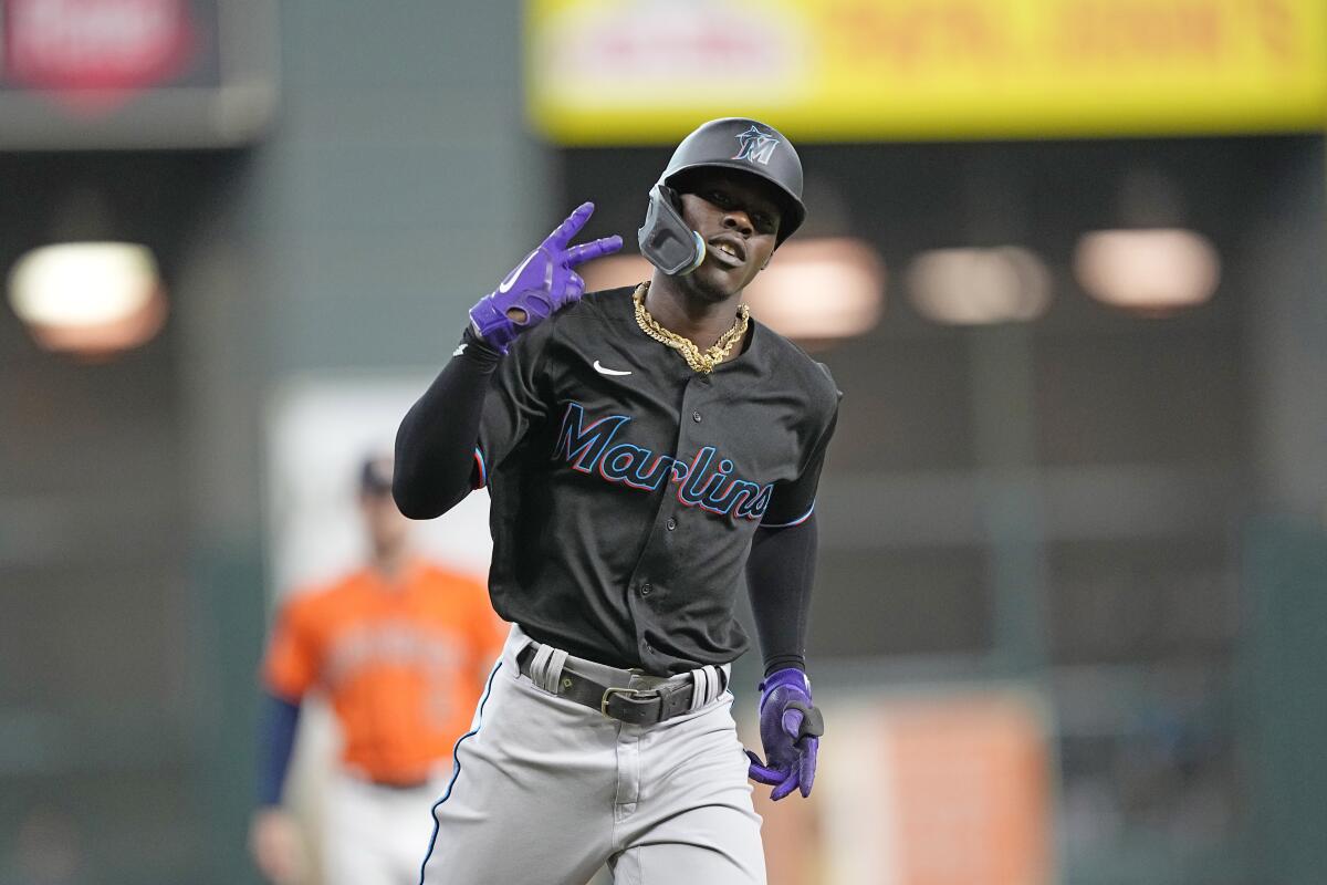 Miami Marlins' Jazz Chisholm Jr. celebrates after hitting a home run against the Houston Astros during the first inning of a baseball game Friday, June 10, 2022, in Houston. (AP Photo/David J. Phillip)