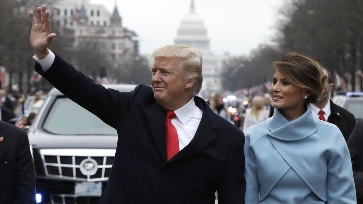 President Trump and First Lady Melania Trump participate in his inauguration parade in Washington on Jan. 20, 2017.