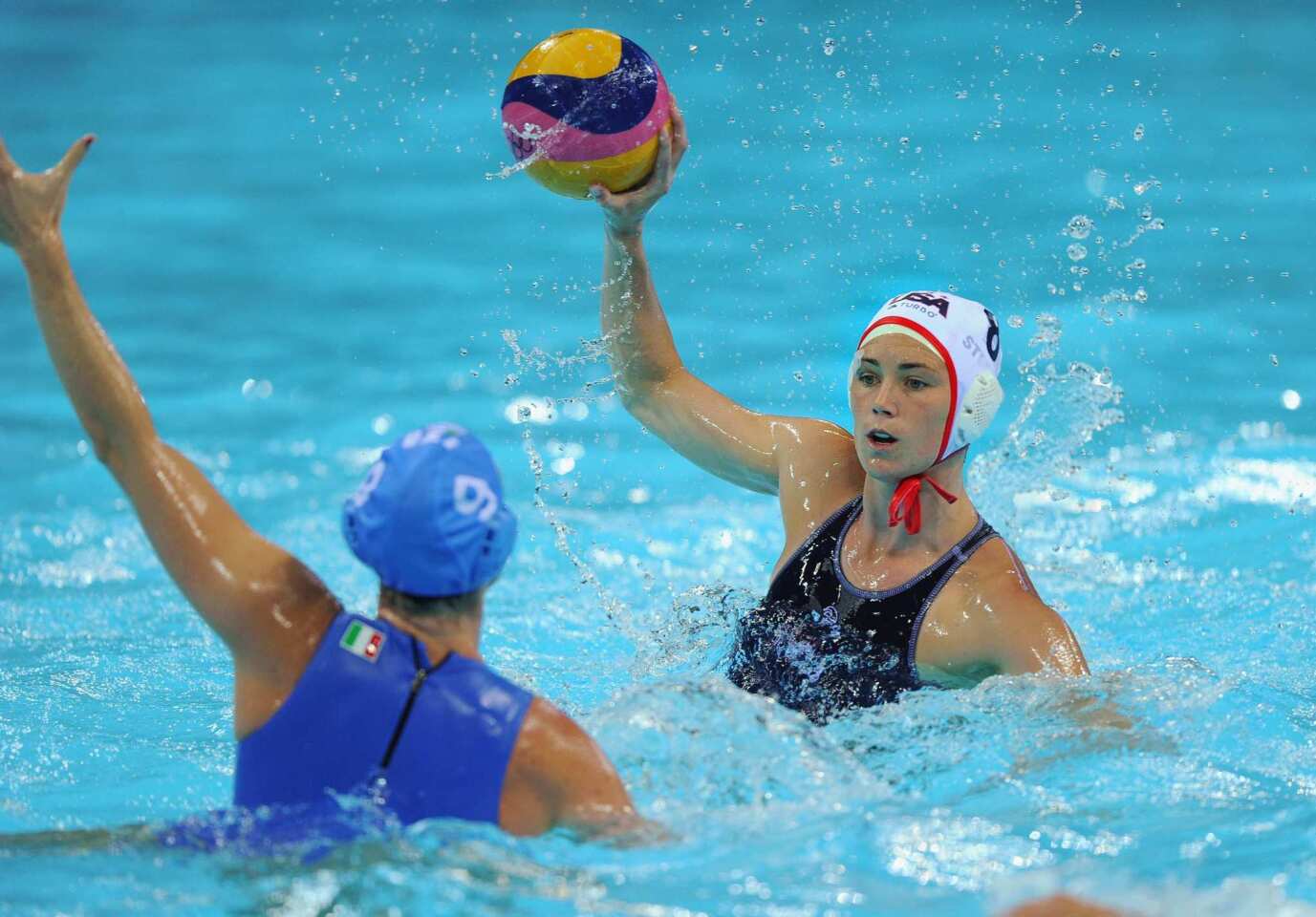 Jessica Steffens of the United States looks to play a pass in a quarterfinal match against Italy. The U.S. topped the Italians 9-6.