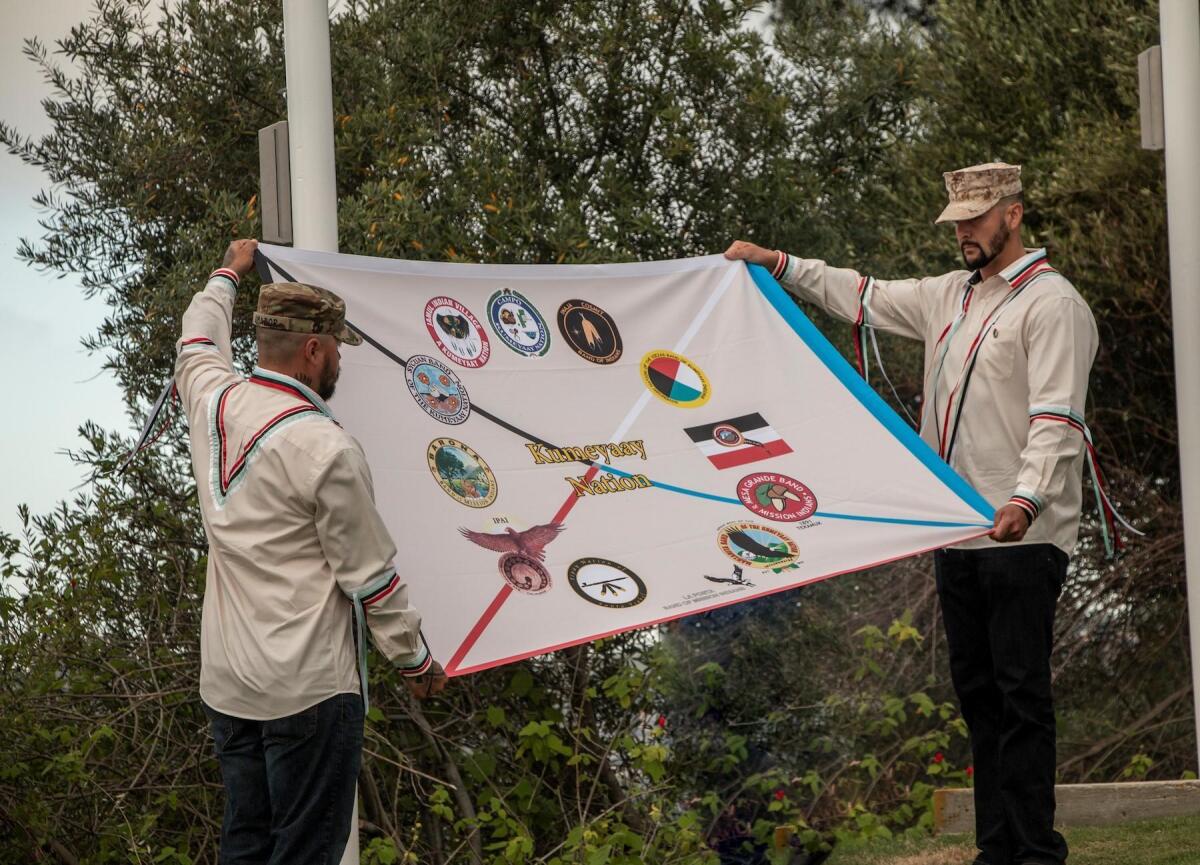 Closeup of the flag representing 12 tribes of the Kumeyaay Nation. Four flags — American, Kumeyaay, Spanish and Mexican — now fly together at Presidio Park in San Diego. The July 16, 2019 event featured the dedication and addition of a Kumeyaay flag to the site.