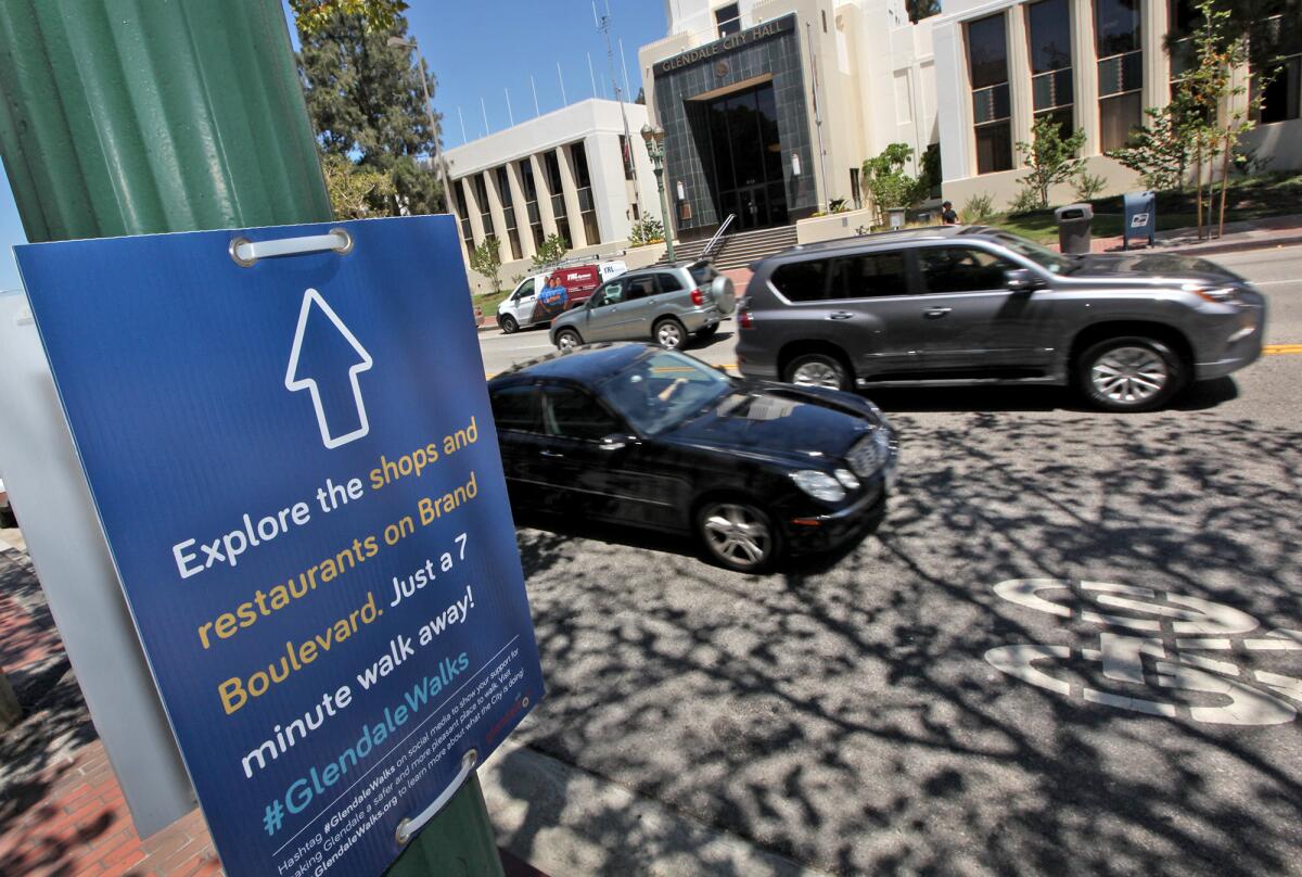 One of 50 new signs that encourage people to walk and direct walkers to local landmarks.