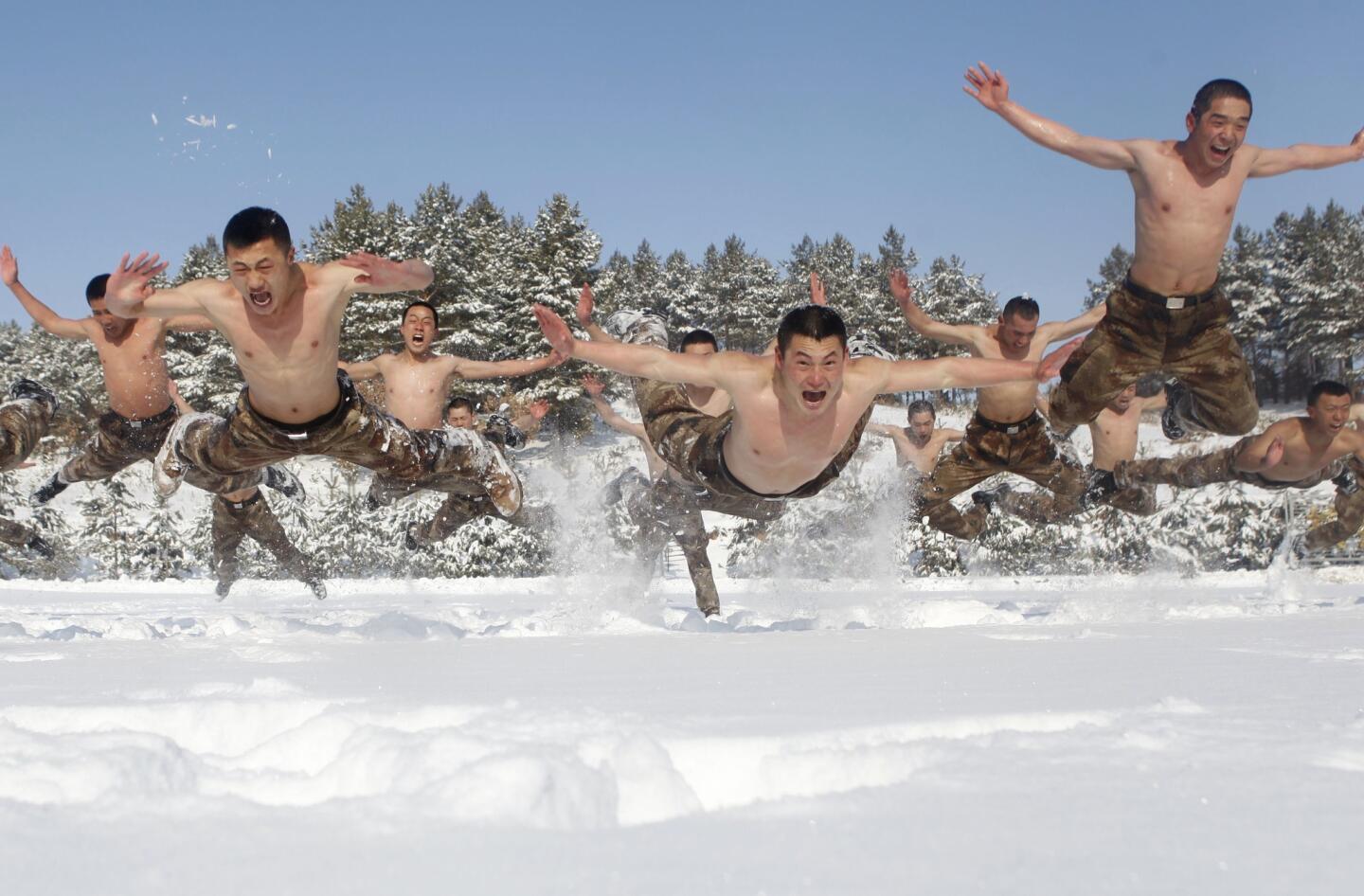 Chinese soldiers train in snow