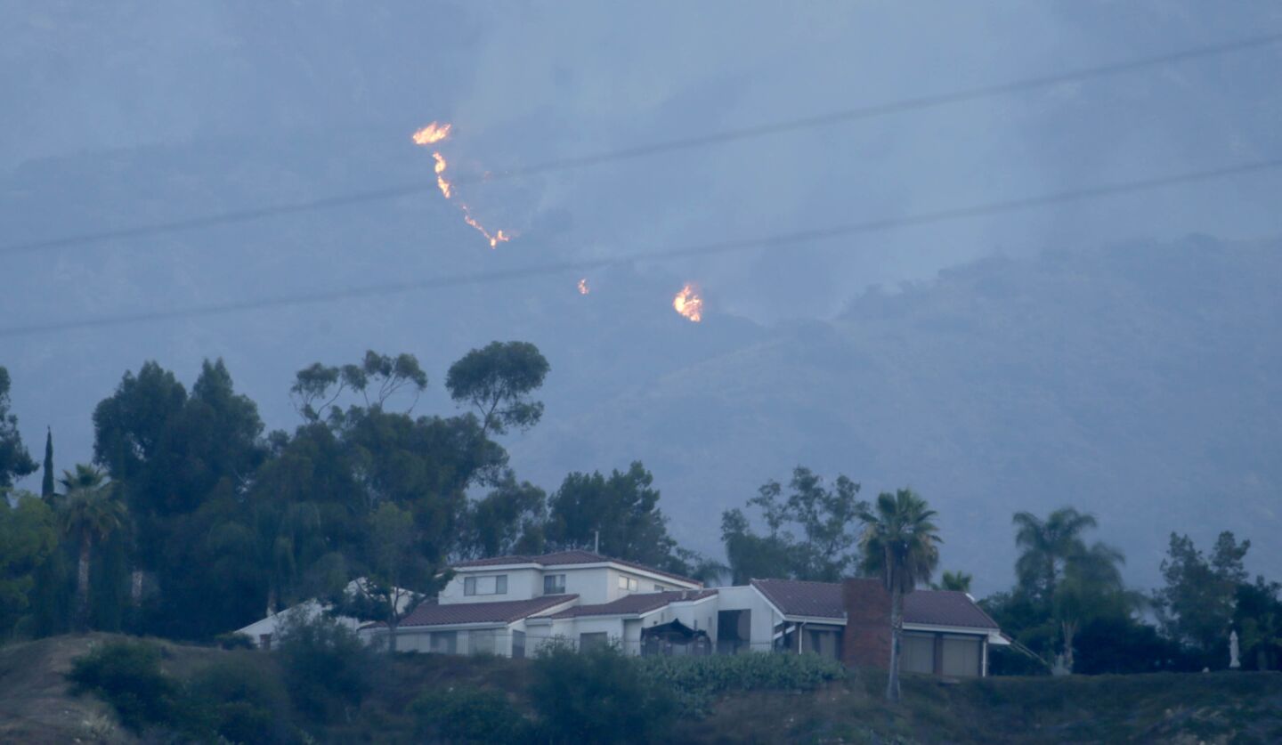 A flare up from the Fish fire can be seen in the hills abouve Duarte early Wednesday morning.