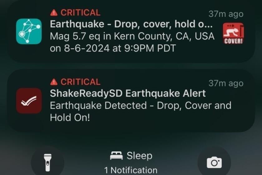 Notifications alerting an Apple iPhone of incoming shaking from a distant earthquake.