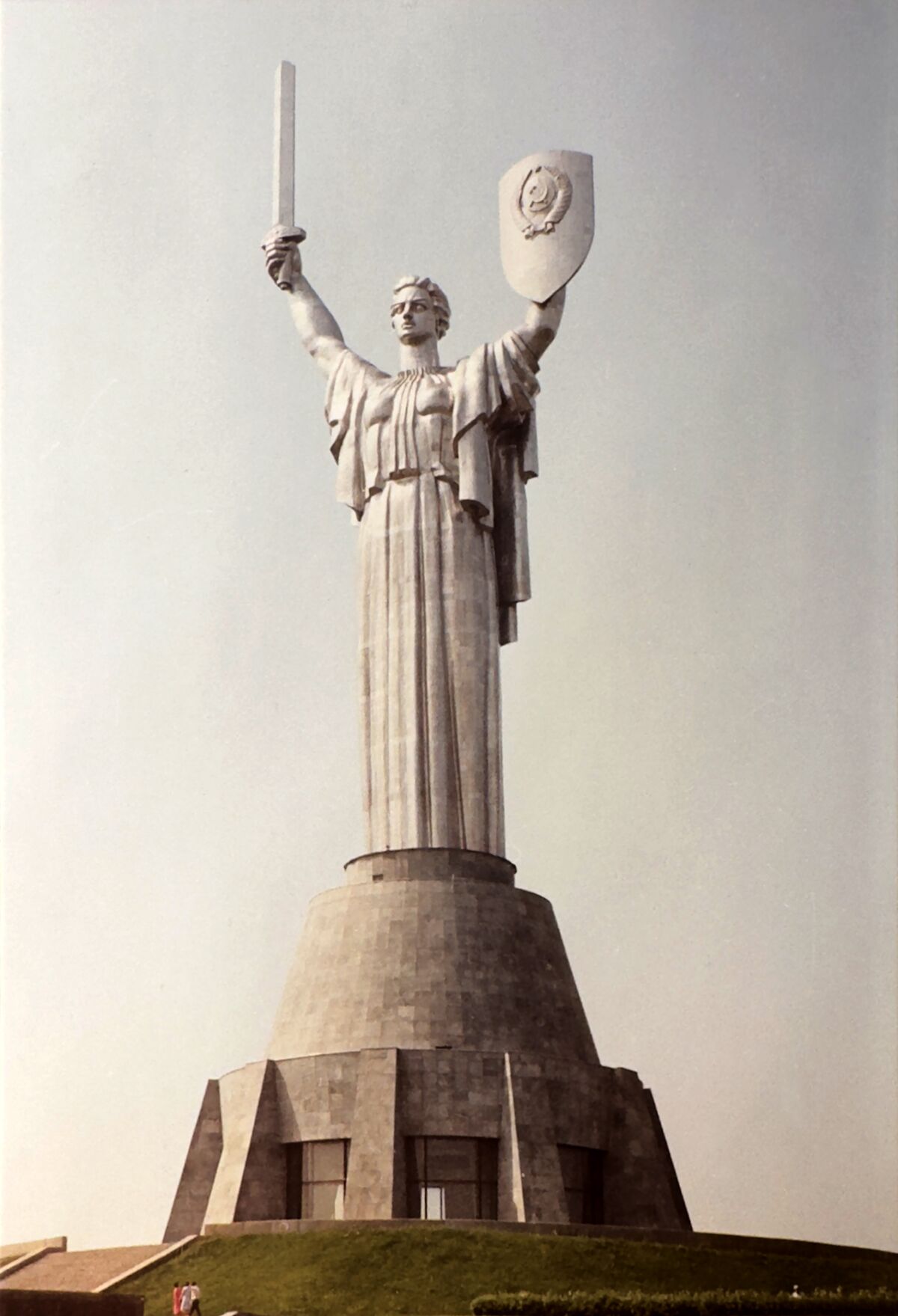 A massive steel monument of a female warrior holding sword and shield rises more than 300 feet into the sky in Kyiv.