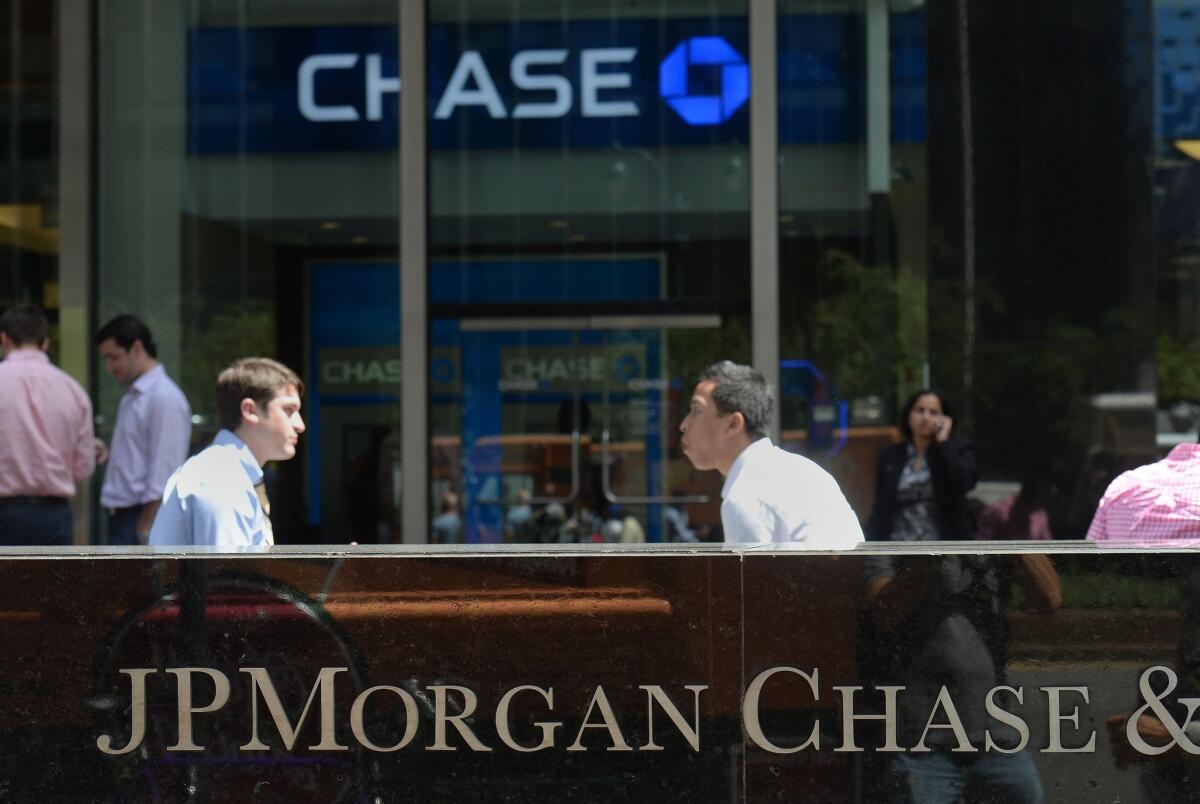 JPMorgan Chase & Co. confirmed Thursday that it was leaving the student loan business, citing a large drop-off in loan originations. Above, outside JPMorgan Chase's headquarters in New York earlier this month.