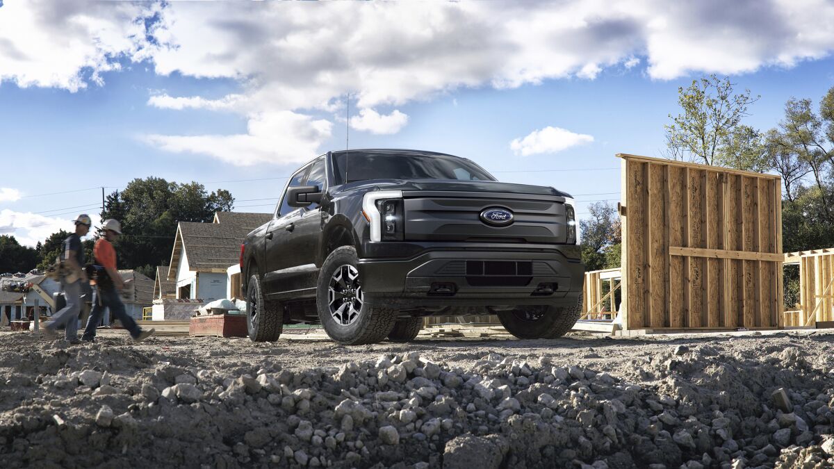 This photo provided by Ford Motor Co., shows the upcoming 2022 Ford F-150 Lightning, that is part of a new generation of emerging electric vehicles. Ford Motor Co. via AP)