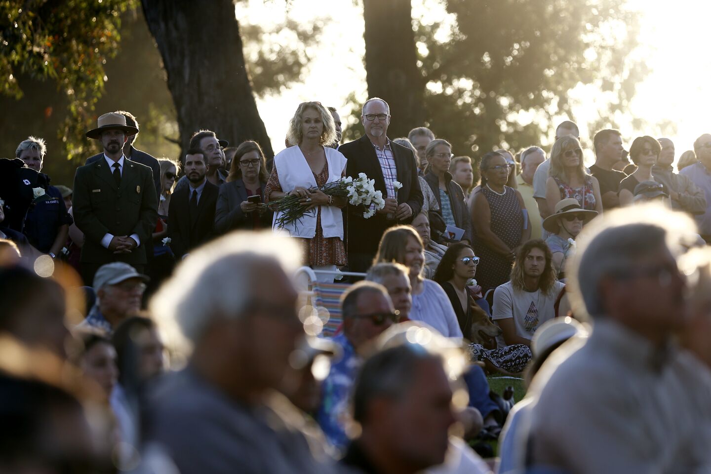 Mourners gather for a vigil at Chase Palm Park in Santa Barbara on Friday evening honoring the victims of the Conception boat fire that broke out off Santa Cruz Island before dawn Monday and claimed 34 lives.