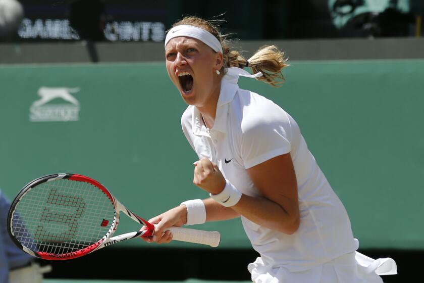 Petra Kvitova celebrates winning the first set against Lucie Safarova during the Wimbledon semifinals on Thursday.