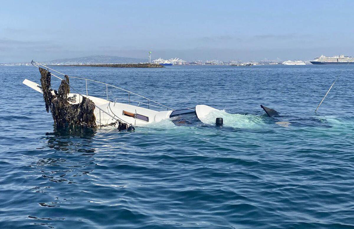 A boat is partially underwater