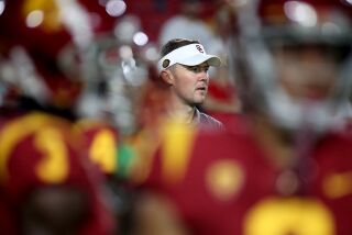 LOS ANGELES, CALIF. - SEP. 17, 2022. USC head coach Lincoln Riley directs pre-game warmups.