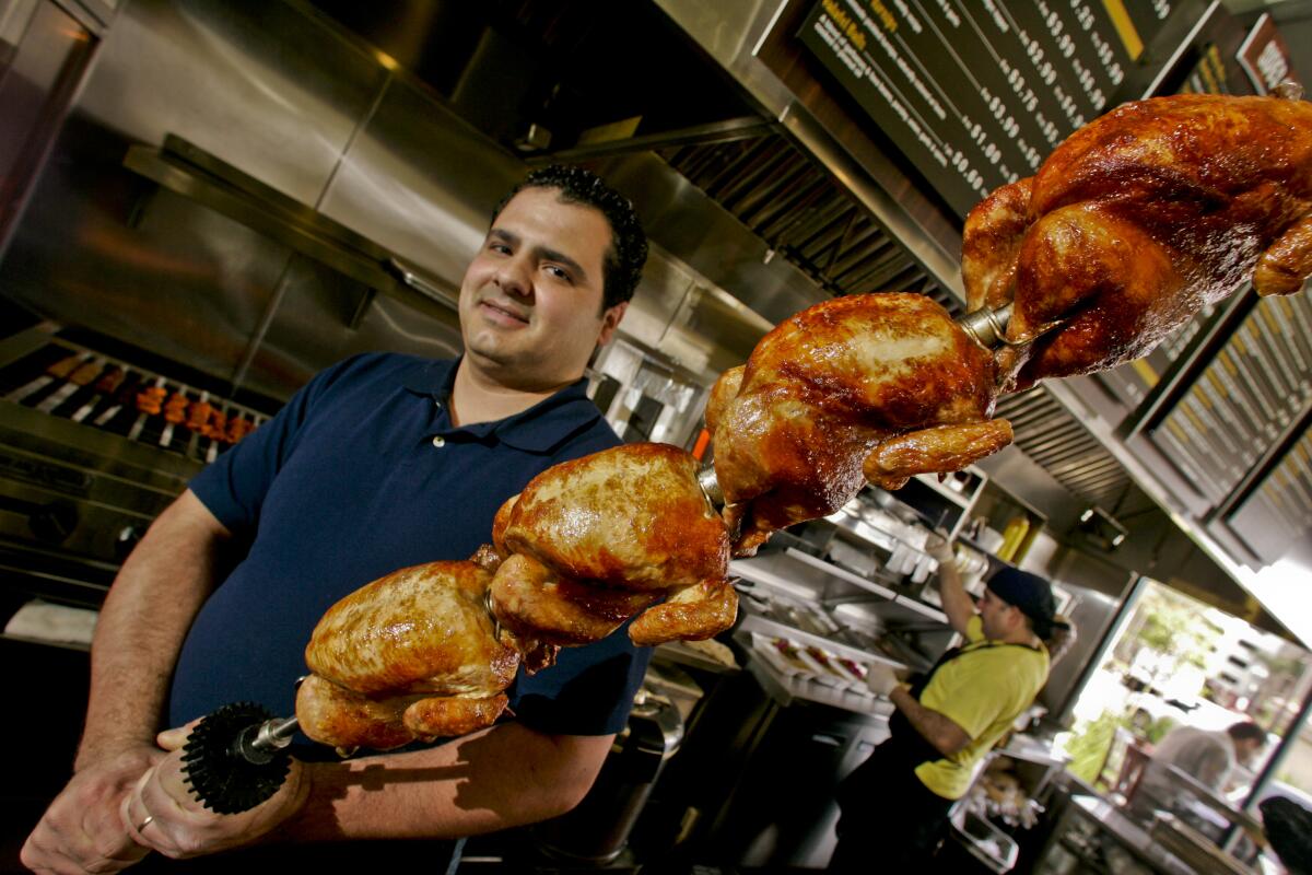 tkes Marjik (Cq), 29, owner of Zankou chicken restaurant in Montebello. 