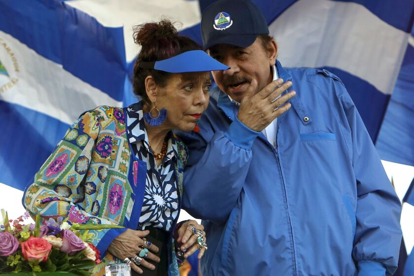 FILE - In this Sept. 5, 2018 file photo, Nicaragua's President Daniel Ortega and his wife and Vice President Rosario Murillo, lead a rally in Managua, Nicaragua. The Central American country has created a National Ministry for Extraterrestrial Space Affairs, The Moon and Other Celestial Bodies. The new agency was approved on Wednesday, Feb. 17, 2021, by 76 legislators in the country's congress, which is dominated by President Daniel Ortega's Sandinista Party. (AP Photo/Alfredo Zuniga, File)