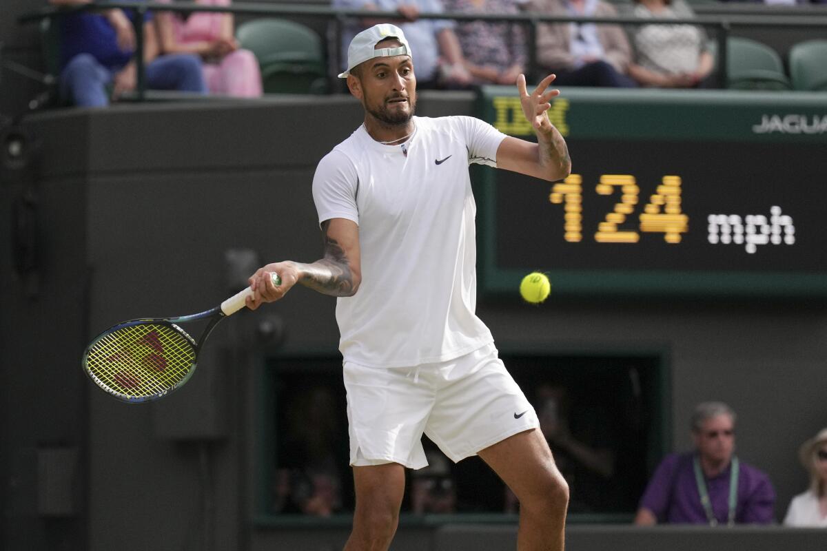 Australia's Nick Kyrgios lines up a shot against Chile's Cristian Garin during a quarterfinal match at Wimbledon.