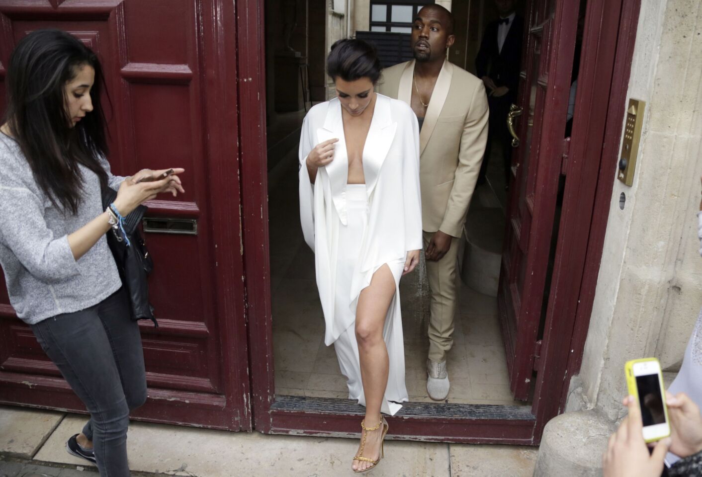 Kim Kardashian and Kanye West leave their residence in Paris on May 23, on the afternoon of the day before their wedding.