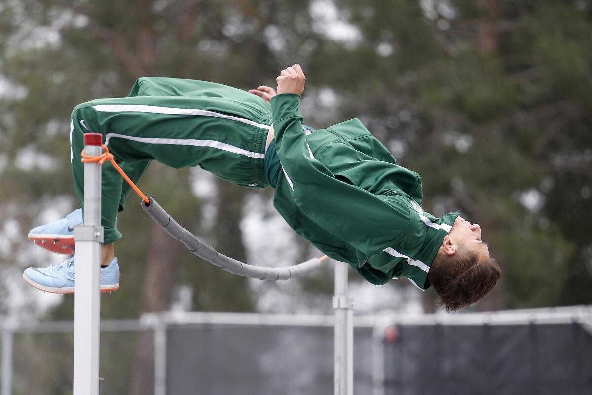 Seth Johnson warms up before competing in the high jump at the Trabuco Hills Invitational on Saturday.
