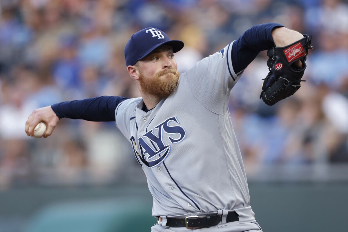 Tampa Bay Rays pitcher Drew Rasmussen delivers to a Kansas City Royals batter during the first inning of a baseball game in Kansas City, Mo., Friday, July 22, 2022. (AP Photo/Colin E. Braley)