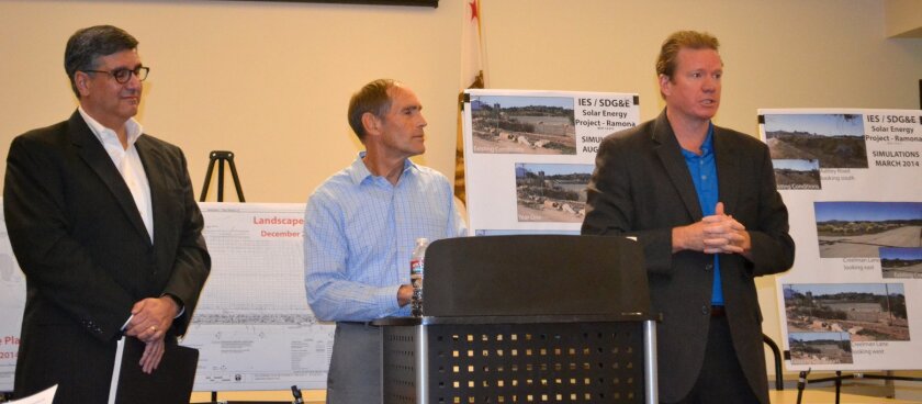 San Diego Gas & Electric's regional public affairs manager, Ian Stewart, right, tells Ramona planning group about the utility's proposed solar project. With him are Eric Johnston with Independent Energy Solutions, left, and Joe Frani, SDG&E project manager.