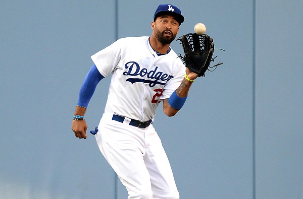 Dodgers center fielder Matt Kemp catches a fly ball hit by Angels first baseman Albert Pujols last month at Dodger Stadium.