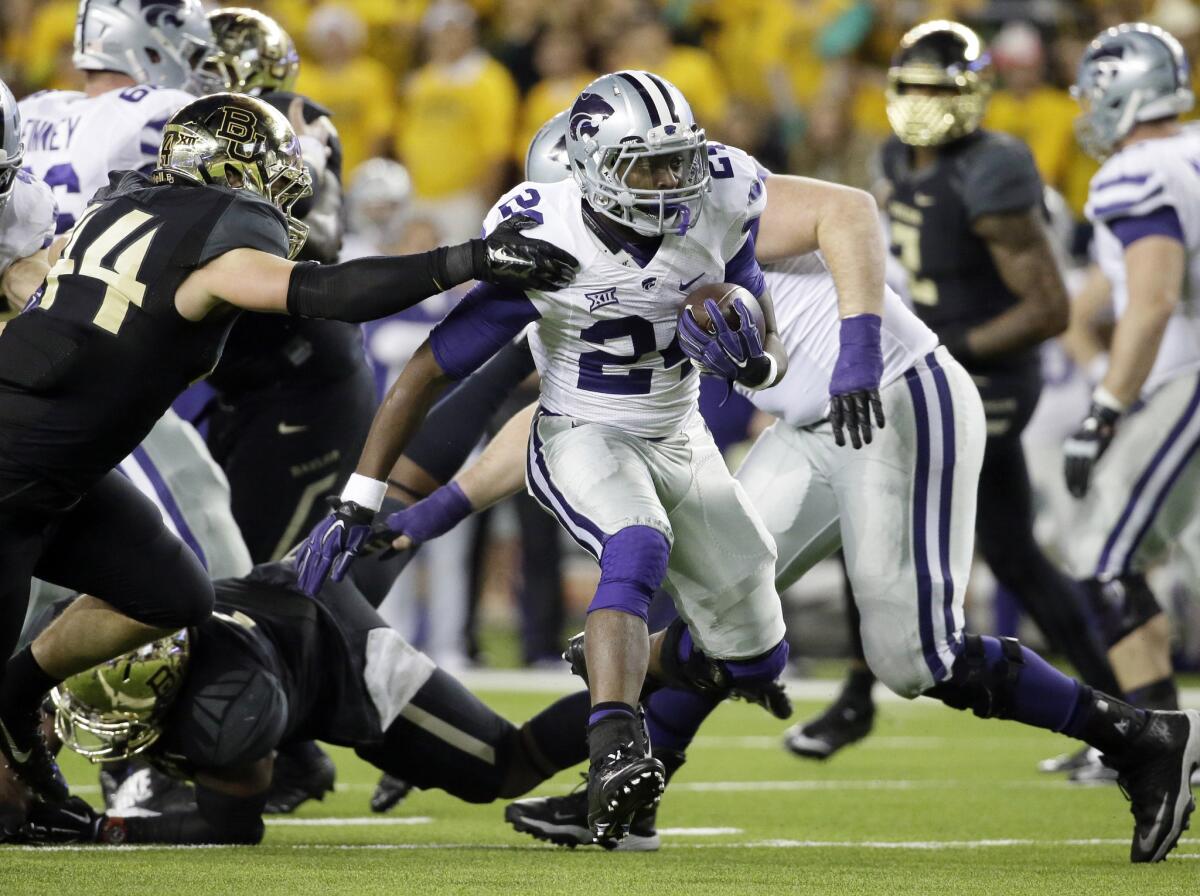 Kansas State running back Charles Jones leads the Wildcats with 521 rushing yards and 13 touchdowns.