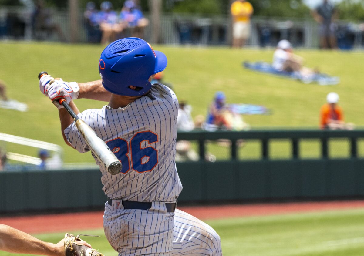 Florida's utility Wyatt Langford (36) with a home run against Central Michigan during an NCAA college baseball tournament regional game Sunday, June 5, 2022, in Gainesville, Fla. (Cyndi Chambers/Ocala Star-Banner via AP)