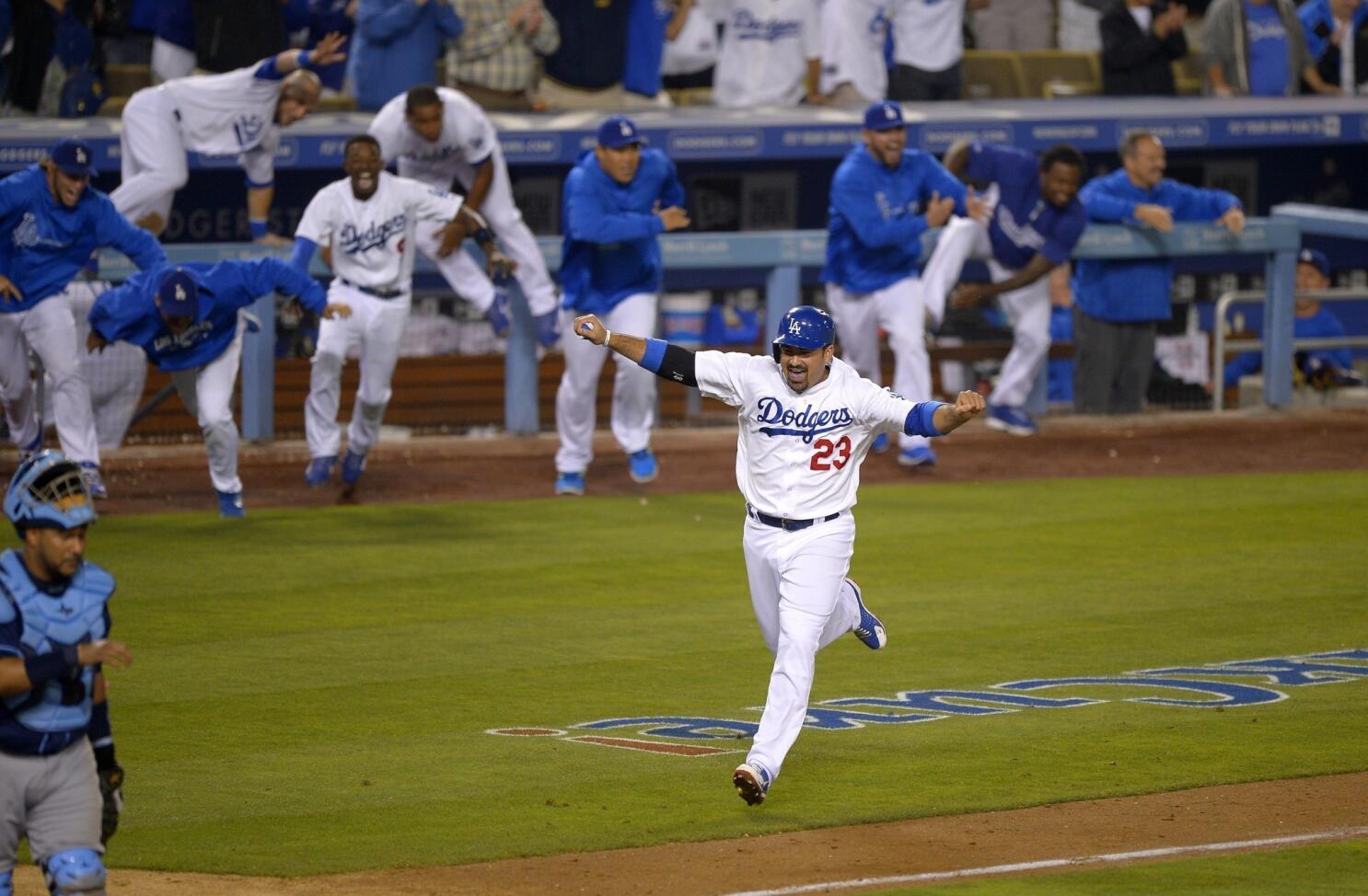 Dodgers score four times in ninth to complete sweep of