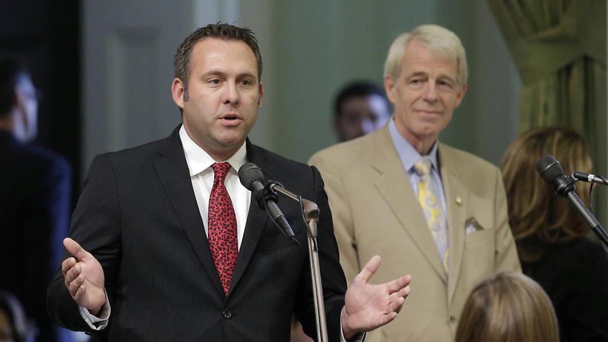Assemblyman Adam Gray (D-Merced), left, is leading a request to audit the state's primary spending program to combat climate change.
